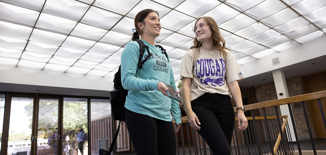 Two students walking to class